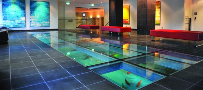 Spectacular Lobby with Unique Glass Floor Aquarium - The Sebel Surry Hills Sydney. Copyright Mirvac Group.
